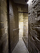 A metal-clad doorway on the stairs inside the Arnolfo Tower on the Palazzo Vecchio in Florence, Italy.