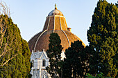 Red tile dome of the Baptistery of St. John at the Pisa Cathedral. Pisa, Italy.