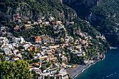 The seaside resort town of Positano terraced on the steep hillside of the Amalfi Coast in Italy.