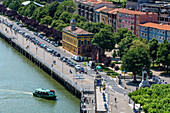 Portugalete town and El Gasolino boat, small boat carrying passengers across the River Nervion, between Portugalete and Las Arenas, Getxo, Vizcaya, Pais Vasco, Spain