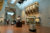 Tourists in the Hall of Choirs or Sala delle Cantorie in the Duomo Museum in Florence, Italy.