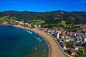 Aerial view of Playa de Baquio Bakio beach, Bizkaiko hondartza Bakioko Biscay, Basque Country, medieval building, battlements, Euskadi, Spain.