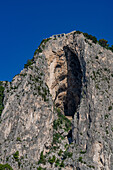 The huge Grotto Castiglione in the limestone cliffs of Capri, Italy, has Roman ruins inside. TheVilla Castiglione is perched on the cliff top.