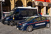 Vehicles of the Carabinieri parked in the Piazza della Repubblica or Republic Square in Florence, Italy.