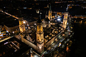 Aerial view of the Cathedral Basilica of Our Lady of the Pillar illuminated at night during Christmas, Zaragoza, Spain