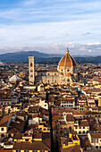 View of the Duomo or Cathedral of Santa Maria del Fiore from the Palazzo Vecchio tower in Florence, Italy.