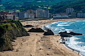 Aerial view of Playa de Baquio Bakio beach, Bizkaiko hondartza Bakioko Biscay, Basque Country, medieval building, battlements, Euskadi, Spain.