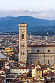 View of the Duomo or Cathedral of Santa Maria del Fiore from the Palazzo Vecchio tower in Florence, Italy.