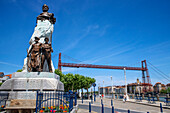 Victor Chavarri sculpture in Portugalete and Vizcaya Bridge, a transporter bridge that links the towns of Portugalete and Getxo, Bilbao province, Basque Country, Euskadi, Spain.