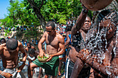 Haiti Voodoo Festival in Saut d'Eau, in Saut d'Eau, Ville Bonheur, Haiti. Thousands of both Vodou and Catholic followers gathered under the Saut d'Eau waterfall in Haiti. The pilgrimage, made by Voodou practitioners and Catholics alike, originated with the sighting of the likeness of the Virgin Mary on a palm leaf close to the falls half a century ago. Catholism and Voodou practices are forever intertwined in its Haitian form. The appearance of a rainbow beneath the falls is said indicate that Danbala - the great lord of the waterfall - and Ayida Wedo - the rainbow - are making love. Fertility