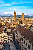 View of the towers of the Badia Fiorentina & Palazzo del Bargello seen from the Palazzo Vecchio tower in Florence, Italy.