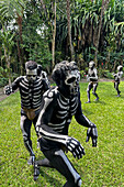 The Skeleton Men from the Omo Bugamo tribe of Papua New Guinea paint their bodies with black and white paint emulating the human skeleton, Chimbu Province, Papua New Guinea