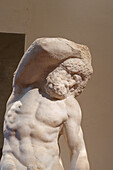 Detail of Bearded Slave, an unfinished statue by Michelangelo in the Accademia Gallery in Florence, Italy.