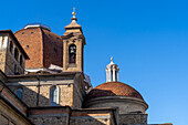 The domes of the Medici Chapel & bell tower of the Basilica di San Lorenzo in Florence, Italy.