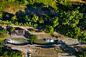 Aerial view Boat crossing the triple Écluse de Fonfile look au Ranchin. Canal du Midi at village of Puichéric Carcassone Aude South of France southern waterway waterways holidaymakers queue for a boat trip on the river, France, Europe