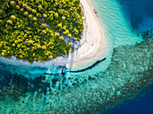 Aerial view of the luxury ower water villas of Six Senses Laamu maldives luxury resort villas, Laamu Atoll region Maldives