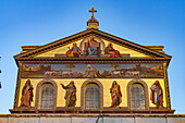 The gold mosaic on the facade of the Basilica of St. Paul Outside the Walls, Rome, Italy.