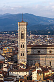 View of the Duomo or Cathedral of Santa Maria del Fiore from the Palazzo Vecchio tower in Florence, Italy.