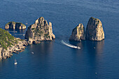 The Farallon Islands or faraglioni, sea stacks off the coast of the island of Capri, Italy, viewed from Monte Solaro.