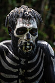 The Skeleton Men from the Omo Bugamo tribe of Papua New Guinea paint their bodies with black and white paint emulating the human skeleton, Chimbu Province, Papua New Guinea