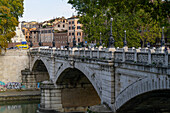 Ponte Giuseppe Mazzini, a stone bridge over the Tiber River in Rome, Italy.