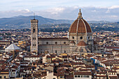 View of the Duomo or Cathedral of Santa Maria del Fiore from the Palazzo Vecchio tower in Florence, Italy.