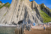 Itzurun beach and Flysch de Zumaia flysch, sedimentary rock formations, Basque Coast Geopark, Zumaia, Gipuzkoa, Basque Country, Spain