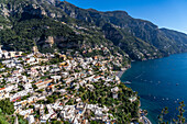 The seaside resort town of Positano terraced on the steep hillside of the Amalfi Coast in Italy.