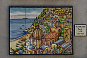 A colorful ceramic tile picture of Positano at a ceramic shop on the Amalfi Coast of Italy.