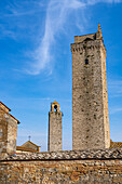 Torre Rognosa, left, and Torre Grossa in the medieval walled town of San Gimignano, Italy.