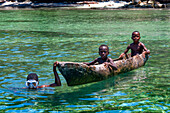 Fishermen in the waterfront beach in Île-à-Vache, Sud Province, Haiti