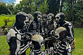 The Skeleton Men from the Omo Bugamo tribe of Papua New Guinea paint their bodies with black and white paint emulating the human skeleton, Chimbu Province, Papua New Guinea