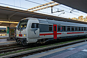 A Trenitalia passenger train passes through the station in La Spezia, Italy.