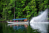 Boat trip at the Kilim Geoforest Park Jetty. Tourist boat starts their journey throw the mangrove forest. Island most exquisite and geologically significant landscapes