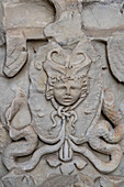 Figured Corinithian capital with a Gorgon originally from Attica, Greece in the Colosseum. Rome, Italy. Used as decoration in the top level of the Colosseum.