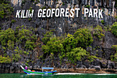 Boat trip at the Kilim Geoforest Park Jetty. Tourist boat starts their journey throw the mangrove forest. Island most exquisite and geologically significant landscapes