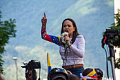 The leader of the opposition Maria Corina Machado, appears at the rally of the opposition called by her, in the streets of Caracas.