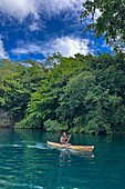 Residents of Vitu Islands in their traditional dugout canoes, Garove Island, Johann Albrecht Harbour, Papua New Guinea