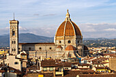 View of the Duomo or Cathedral of Santa Maria del Fiore from the Palazzo Vecchio tower in Florence, Italy.