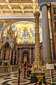 Pascual or Easter candlestick in the Basilica of St. Paul Outside the Walls, Rome, Italy. A marble pillar carved with Biblical scenes. c. 1170 A.D.