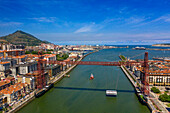 Aerial view of Vizcaya Bridge, a transporter bridge that links the towns of Portugalete and Getxo, Bilbao province, Basque Country, Euskadi, Spain.