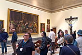 Tourists in a gallery in the Pinacoteca in the Vatican Museums, Vatican City, Rome, Italy.