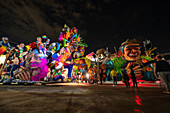 In the workshop, just a few hours before the parade, artisans fine-tune the last details and carry out the final assembly of their floats and individual costumes, preparing these magnificent works for the Great Parade of the Black and White Carnival. Pasto, Nariño, Colombia. January 5, 2025.