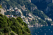 The seaside resort town of Positano terraced on the steep hillside of the Amalfi Coast in Italy.