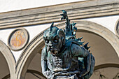 Fountain statue of a sea monster on the Piazza Santissima Annunciata, Florence, Italy.