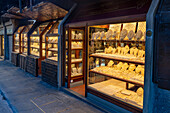 Luxury jewelry stores line the Ponte Vecchio bridge in Florence, Italy.