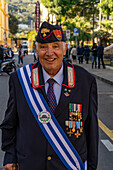 An Italian military veteran with his medals after a war memorial celebration in Sorrento, Italy.