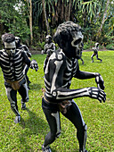 The Skeleton Men from the Omo Bugamo tribe of Papua New Guinea paint their bodies with black and white paint emulating the human skeleton, Chimbu Province, Papua New Guinea