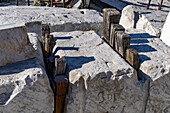 Display of earliest method for splitting marble blocks with wooden wedges. Fantiscritti Quarry Museum, Carrara, Italy. This was the technique used by the early Greeks and Romans.