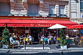 Le Relais de lEntrecote is traditional French restaurant decorated for Christmas. It located in historical centre of Paris near Champs Elysees avenue